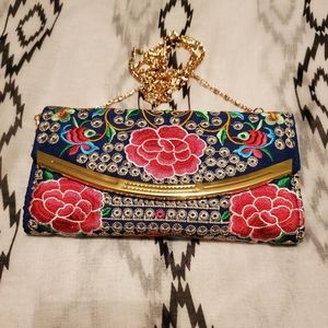 Embroidered clutch